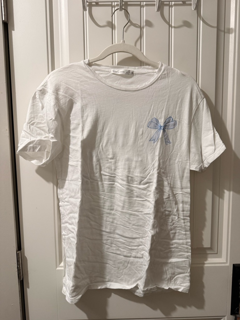 Altar'd State White Tee with Subtle Floral Tag Detail